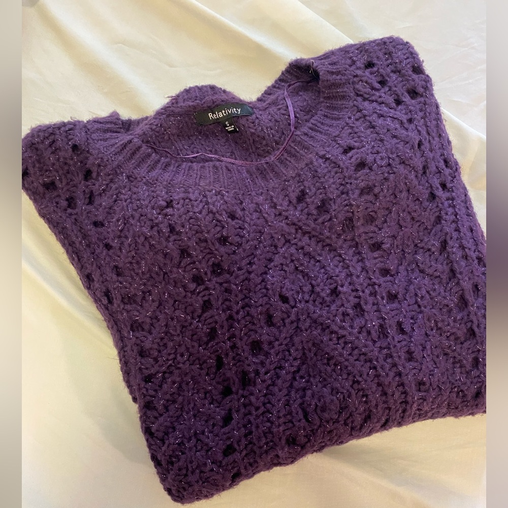 Relativity woman’s sweater size S.
